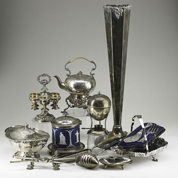 ANTIQUE SILVER-PLATE;: Twelve items, 19th/20th c.: Jasperware biscuit jar, egg epergne with gilt bowls, egg coddler with burner, floor vase with grapevine motif, (2) Sheffield fish servers, telescoping trivet, Blackington s
