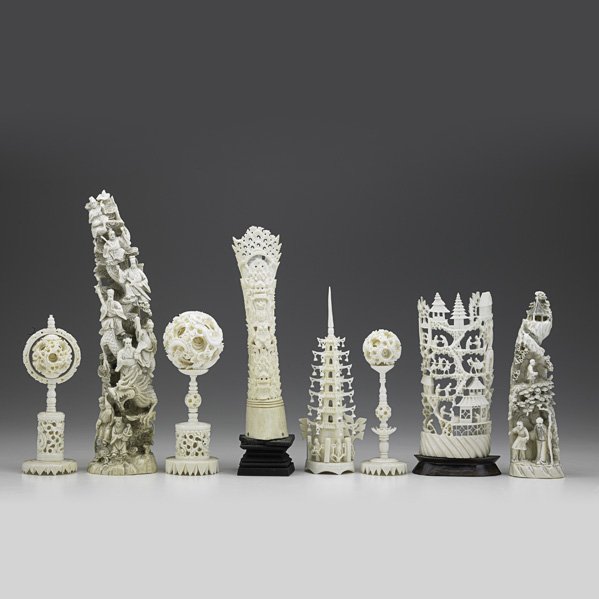 ASIAN IVORY FIGURES;: Eight, 20th c.: three puzzle ball statues, two tusk carvings and three tall associated carvings; Tallest: 11 3/4"