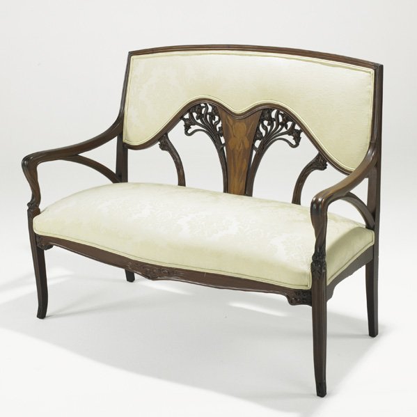 ART NOUVEAU SETTEE: Mahogany frame, upholstered seat and back, floral inlaid center medallion, ca. 1900; 40" x 50" x 23"