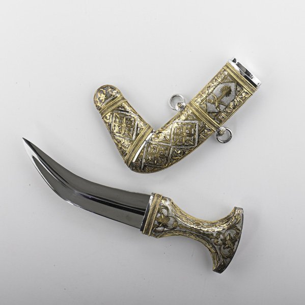 PRESENTATION DAGGER: Jambiya clad in silver and gold from Saudi Arabia by Ahmed ibu Ahyam Badr in fitted presentation box, late 20th c.; Signed; Dagger: 10 3/4"