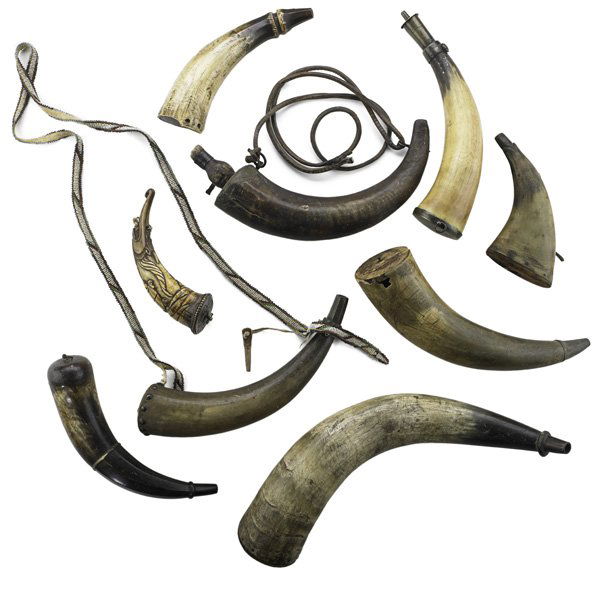 POWDERHORN GROUP;: Nine include brass tack with beaded strap and one heavily engraved with nautical scenes, 18th/19th c.; Longest: 15 1/2"