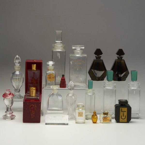 BACCARAT, ETC: Twenty-one pieces: perfumes and cologne bottles for Guerlain, Paquin, Ecarlate de Suzy, Houbigant, etc; Most marked; Tallest: 8 1/2"