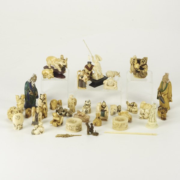 NETSUKES, SUMIDAGAWA, ETC.: Thirty-five pieces, 19th/20th c.: ivory Netsuke rats in bag, two Sumidagawa wisemen, ivory fisherman, ivory rat on a turtle, etc; Some signed; Tallest: 6"