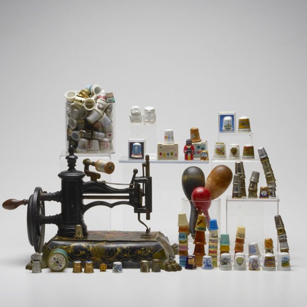 KETCHUM'S SEWING MACHINE: Ketchum's patent sewing machine, together with collection of approximately 200 thimbles; 19th/20th c; Sewing machine marked Ketchum's Patent 1863; 9 1/4" x 13 1/2" x 8"