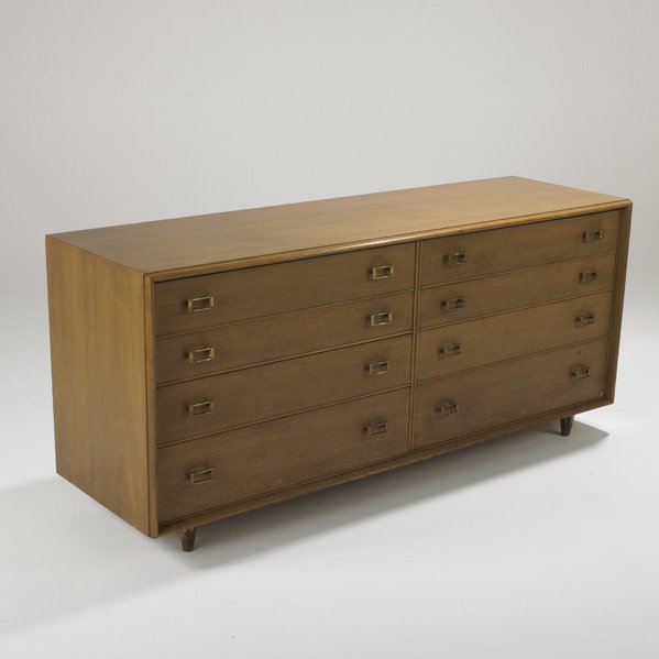 PAUL FRANKL; JOHN STUART FURNITURE CO.: Double dresser, USA, 1940s; Bleached mahogany and brass; Labeled; 32 1/2" x 72" x 22"