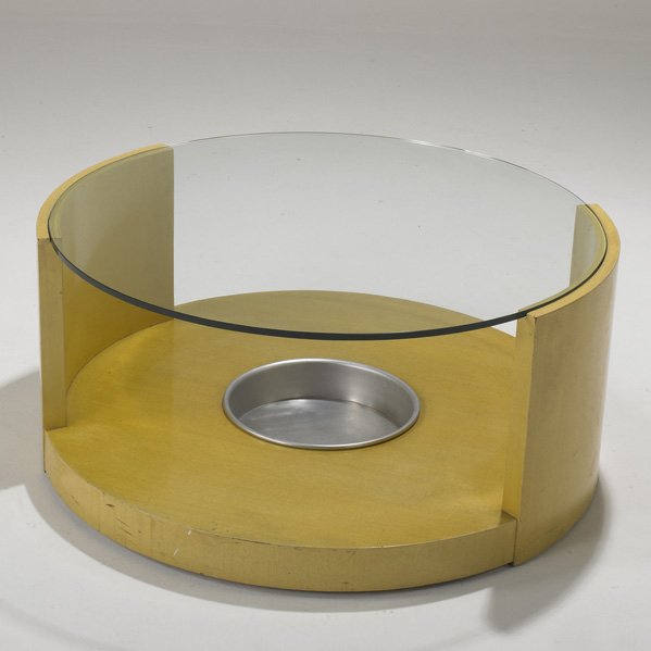 GILBERT ROHDE: Coffee table with inset planter, USA, 1930s; Birch, glass and aluminum; Unmarked; 16" x 35 1/2" dia