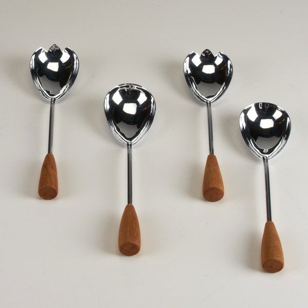 RUSSEL WRIGHT: Rare four-piece salad set, USA, 1930s; Chromium plated metal, cherry wood; One stamped; Each: 10" x 2 1/2" (Provenance: Purportedly given by Wright family to Oscar Usbeck, on the occasion of his weddi