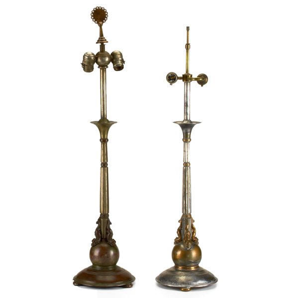 OSCAR BACH: Assembled pair of table lamps with dolphin bases, New York, c.1927; Patinated and nickel-plated bronze; Both signed, two socket each; To finial:33 1/2" x 8"