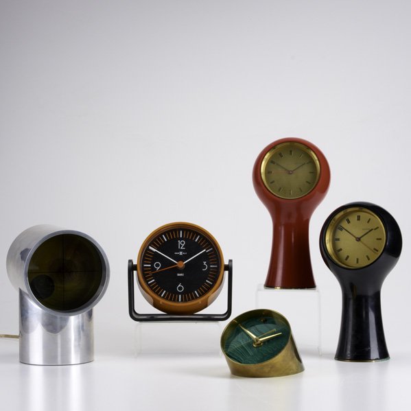 ANGELO MANGIAROTTI AND BRUNO MORASSUTTI, ETC: Five desk clocks: two Seticon, Kirsch/Hamilton Aurora clock, Howard Miller, and unmarked faux malachite clock; Tallest: 9 1/2"