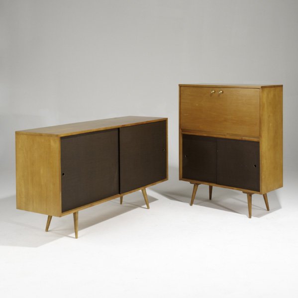 PAUL McCOBB; WINCHENDON: Planner Group two-door cabinet and drop-down desk cabinet, USA, 1950s; Birch, painted canvas and brass; Foil labels; Desk: 46 1/4" x 36" x 15 1/4" and cabinet: 33 1/4" x 60" x 18 1/4"