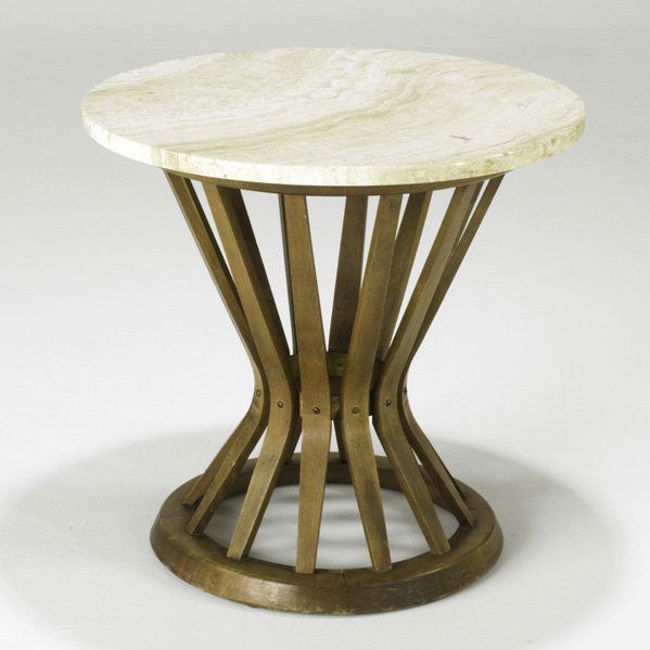 STYLE OF EDWARD WORMLEY: Occasional table, USA, 1960s; Travertine, beech and brass; Unmarked; 20 1/4" x 21" dia
