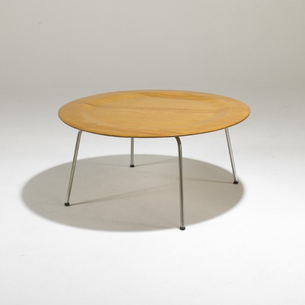 CHARLES & RAY EAMES; HERMAN MILLER: Coffee table (CTM), USA, 1950s; Ash plywood and matte chromed steel; Unmarked; 16" x 34" dia.