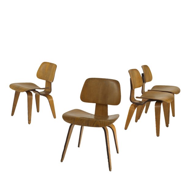 CHARLES AND RAY EAMES; HERMAN MILLER: Four dining chairs (DCW's), USA, 1950s; Ash plywood and rubber; Unmarked; Each: 29" x 19" x 20"
