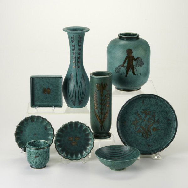 WILHELM KAGE; GUSTAVSBERG: Nine Argenta pieces with silver overlay, Sweden, c.1930; Three vases, bowl, tea bowl, saucers, and plates; All marked; Tallest: 8 3/4"