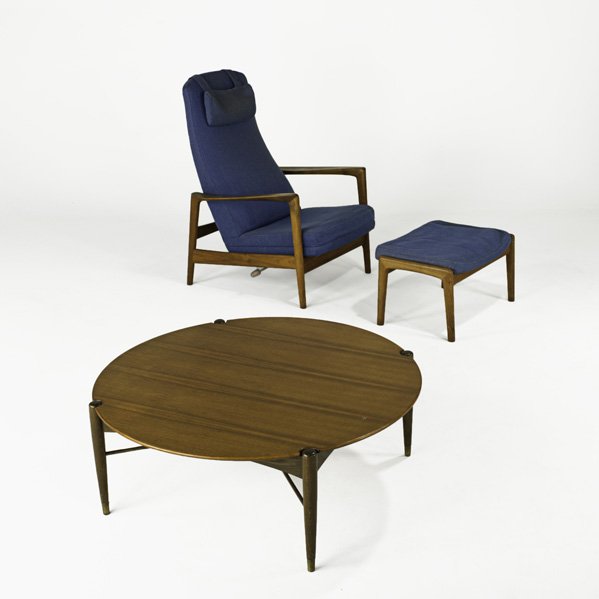 FOLKE OHLSSON: Coffee table, adjustable lounge chair and ottoman; Sweden, 1960s; Teak, beech, wool and brass; Manufacturer labels; Coffee table: 15" x 40" dia, chair: 40" x 29 1/2" x 34"