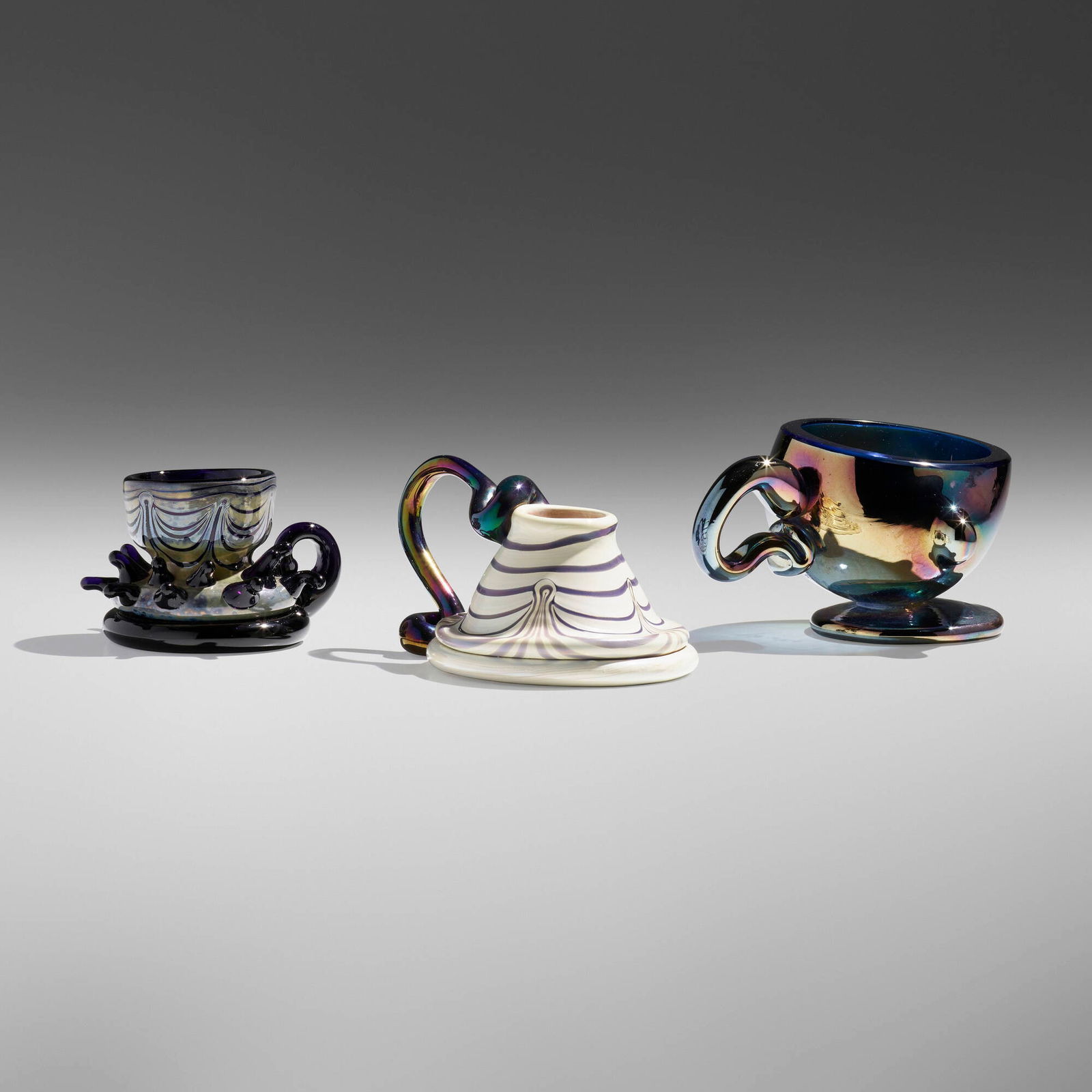 Marvin Lipofsky and James Carpenter, attribution, Collection of three early cups: Marvin Lipofsky and James Carpenter, attribution Collection of three early cups USA, 1978hand-blown glass 3.5 h x 6 w x 4.75 d in (9 x 15 x 12 cm) 3.125 h x 5.75 w x 4.25 d in (8 x 15 x 11 cm)