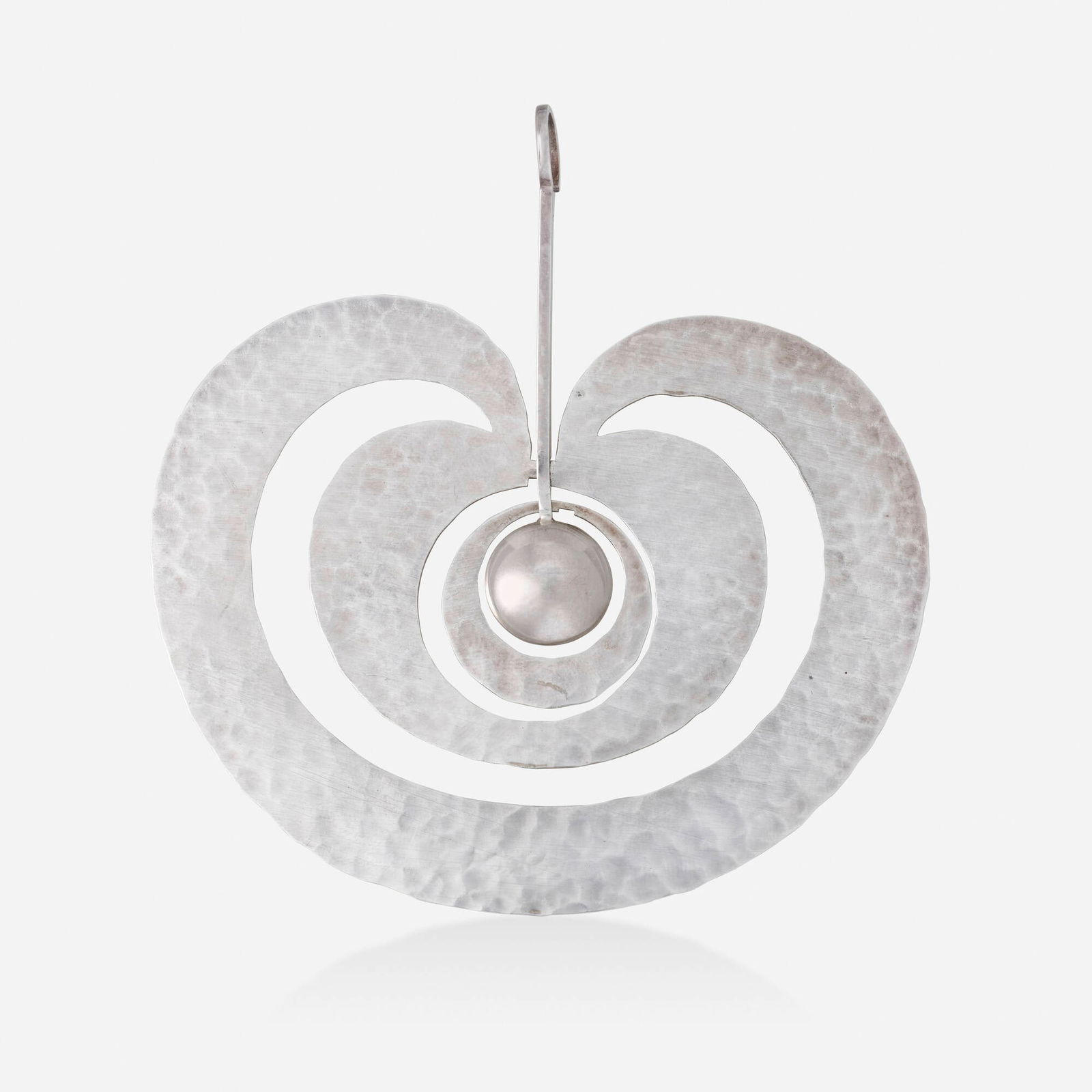 Tapio Wirkkala, 'Omena' sterling silver pendant: Tapio Wirkkala 'Omena' sterling silver pendant Of hammered silver, center segments removeable; designed by Kultakeskus Oy; c. 1975 Sterling silver 3.25 x 3 in; Gross weight 10.6 dwts T