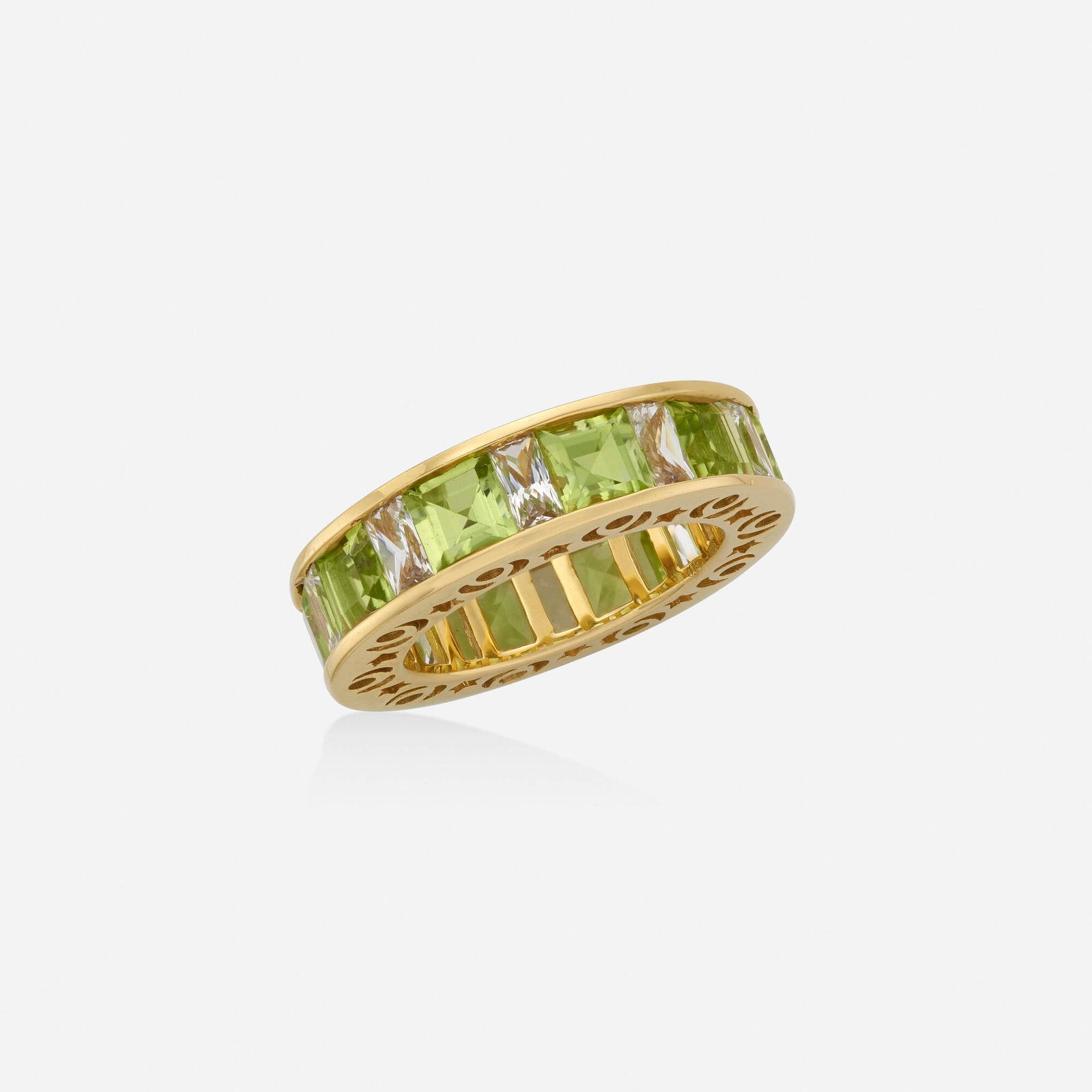 Peridot, white sapphire, and gold band ring (1 of 2)
