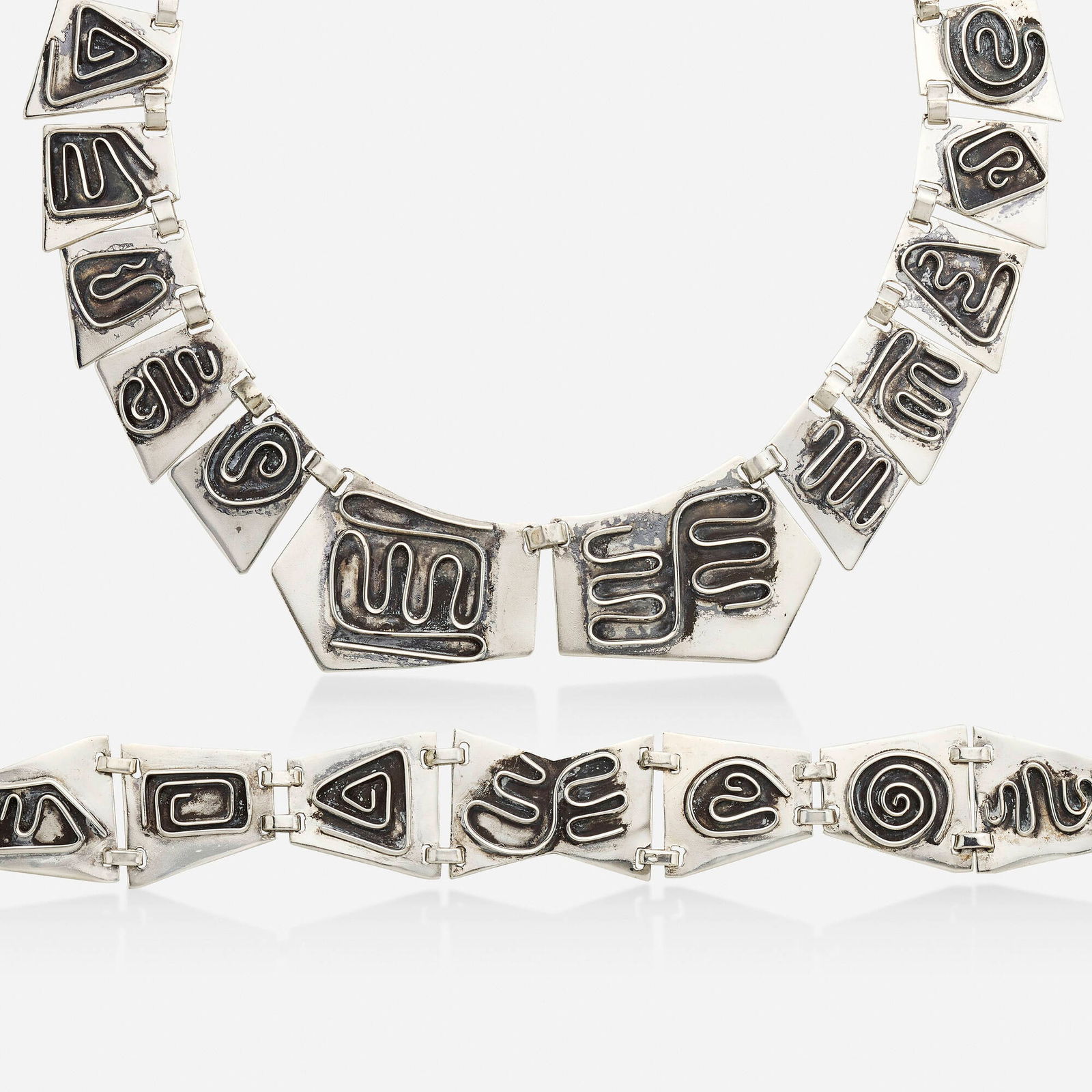 Ed Wiener, Sterling silver necklace and bracelet: Ed Wiener Sterling silver necklace and bracelet Of geometric design, one-of-a-kind; 1950s Sterling silver Signed Ed Wiener to each Necklace 15 in, bracelet 8 in; Gross weight 74.9 dwts