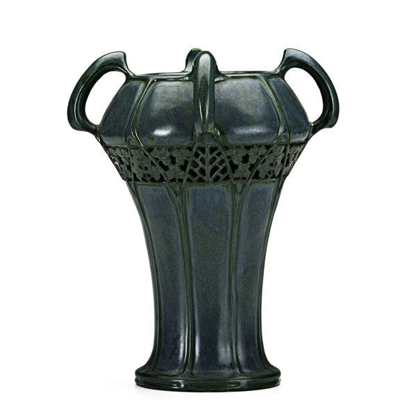 RIESSNER, STELLMACHER & KESSEL Four handled vase: RIESSNER, STELLMACHER & KESSEL; TURN-TEPLITZ; Four-handled Amphora vase with reticulated clover decoration; Circular raised stamp Stellmacher/Teplitz; 7 1/2" x 7 3/4" dia.