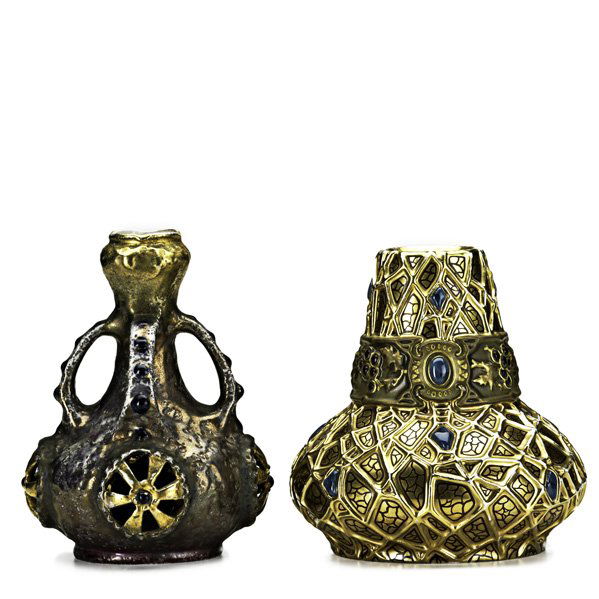 AMPHORA Two vases: AMPHORA; Two jeweled and gilt decorated vessels: Imperial Amphora, four-handled vase with reticulated roundels, and squat vase with holly decoration; Handled vase marked Imperial Amphora Turn, the oth