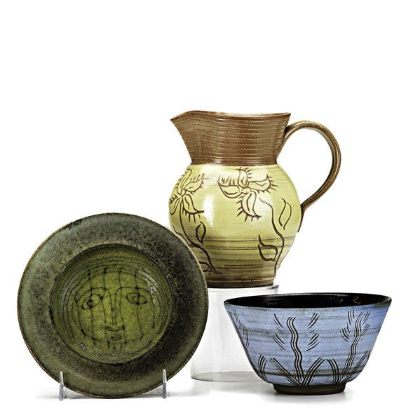 EDWIN AND MARY SCHEIER Three pieces: EDWIN AND MARY SCHEIER; Three vessels: Sgraffito pitcher with florals, stoneware bowl with incised florals, and small bowl with face; All signed SCHEIER; Pitcher 5 3/4" Publication: Forster, Alternati