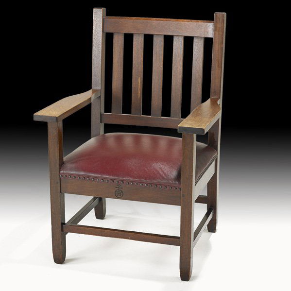 ROYCROFT Mahogany armchair: ROYCROFT; Mahogany slatted armchair, East Aurora, NY, ca. 1905; Carved orb and cross mark; 39" x 27" x 23"