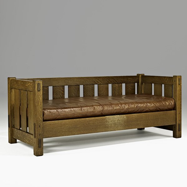 GUSTAV STICKLEY Even-arm settee: GUSTAV STICKLEY; Early even-arm settee (no. 208), Eastwood, NY, ca. 1904; Large red decal; 29" x 72" x 32"