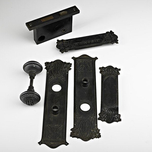 LOUIS SULLIVAN Six-piece door hardware set: LOUIS SULLIVAN; YALE & TOWN MFG. CO.; Six-piece door hardware set from the Union Trust Building, Saint Louis, MO, ca. 1900: door plates and pull, lock, mail slot, and mail slot cover, door pull monogr