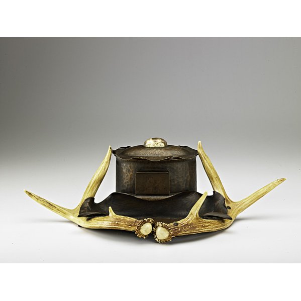 ALBERT BERRY Rare smoking set: ALBERT BERRY; Rare smoking set, comprising humidor, ashtray and matchbox holder, Seattle, WA, ca. 1920; Hammered copper, antlers; Stamped Berrys Craft Shop, Their Mark, Seattle; 5 1/2" x 19" x 10"
