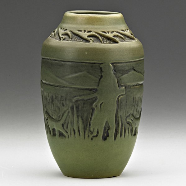NORTH DAKOTA SCHOOL OF MINES "Duck Hunter" vase: JULIA MATTSON; NORTH DAKOTA SCHOOL OF MINES; Carved vase, "Duck Hunter," Grand Forks, ND; Indigo stamp, artist's initials, title and numbers; 6 1/2" x 4" Publication: Forster, UND Pottery, p. 34