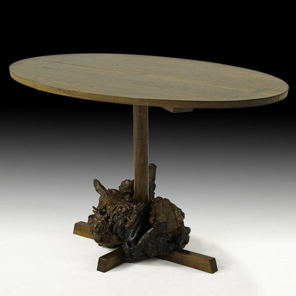 MIRA NAKASHIMA Dining table: MIRA NAKASHIMA; NAKASHIMA STUDIOS; Dining table, New Hope, PA, 1994; Walnut, root burl, rosewood; Signed and dated; 28 1/2" x 48" x 29 1/2" Provenance: Letter of authentication from Mira Nakashima