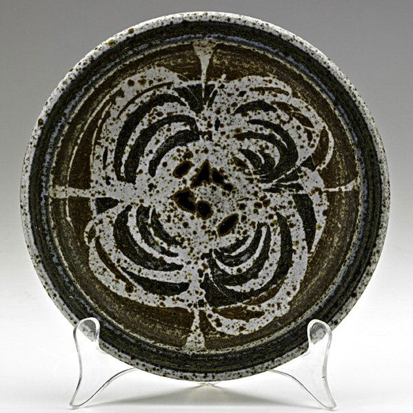 PETER VOULKOS Small footed dish: PETER VOULKOS; Small glazed stoneware footed dish, 1950s; Signed; 1 3/4" x 7 1/2" dia. Publication: Forster, Alternative American Ceramics, p. 136