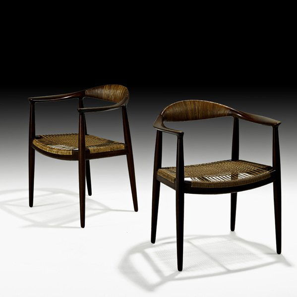 HANS WEGNER; JOHANNES HANSEN Pr. of The Chair: HANS WEGNER; JOHANNES HANSEN; Pair of The Chair, Denmark, 1950s; Teak, woven cane; Branded; 30" x 25" x 21"