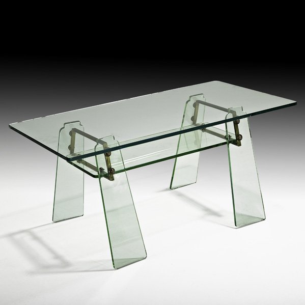 PIETRO CHIESA ; FONTANA ARTE Glass coffee table: PIETRO CHIESA; FONTANA ARTE; Rectangular coffee table, Italy, 1950s; Crystal, brass, glass; Unmarked; Base only: 17 1/2" x 26 3/4" x 19 1/2", top: 38 1/2" x 20" Provenance: Donzella Gallery, New York