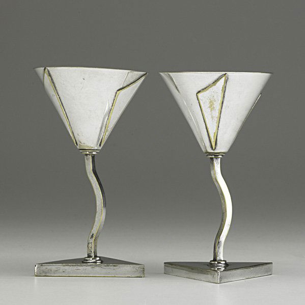 ELSA TENNHARDT Pair of rare silver-plated cordial: ELSA TENNHARDT; E. & J. Bass Co.; Pair of rare silver-plated cordials, New York, ca. 1930; Stamped E. & J. B 9165/ US Patent No. 95939; 4 3/4" x 2 3/4" dia.