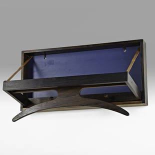 ADAM HOFF & POUL OSTERGAARD Wall valet: ADAM HOFF & POUL OSTERGAARD; VIRUM; Wall-hanging valet, Denmark, 1960s; Rosewood, leather, enameled masonite; Unmarked; 15" x 22" x 11 1/2"