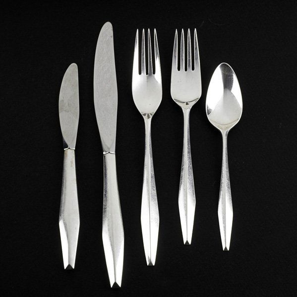 AFTER GIO PONTI; REED & BARTON Sterling flatware: AFTER GIO PONTI; ROBERT RAMP; REED & BARTON; "Diamond" sterling silver 33-piece flatware service for six, Taunton, MA, 1950's; Dinner knives (6), dinner forks (6), salad forks (6), teaspoons (8), butt