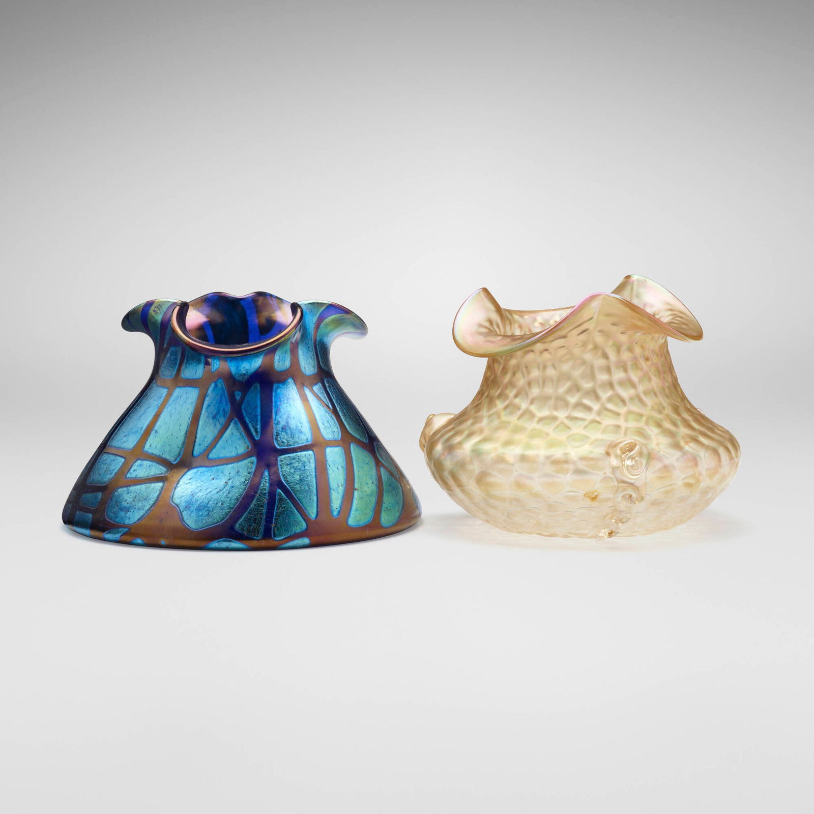 Loetz, Pampas and Nautilus vases, set of two: Loetz Pampas and Nautilus vases, set of two Austria, c. 1899, 1903hand-blown glass 4.25 h x 5.75 dia in (11 x 15 cm) 4 h x 6 dia in (10 x 15 cm) Provenance: Collection of V