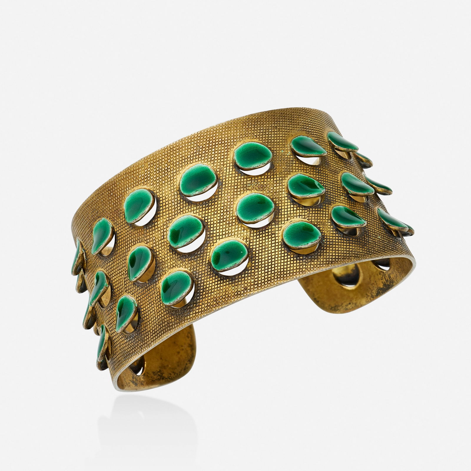Grete Prytz Kittelsen, Sterling silver-gilt and enamel cuff bracelet: Grete Prytz Kittelsen Sterling silver-gilt and enamel cuff bracelet Designed with green enamel scales; 1950s Sterling silver-gilt Signed J. Tostrup Inner circ. 6.50 in, width 1.25 in; Gross weigh