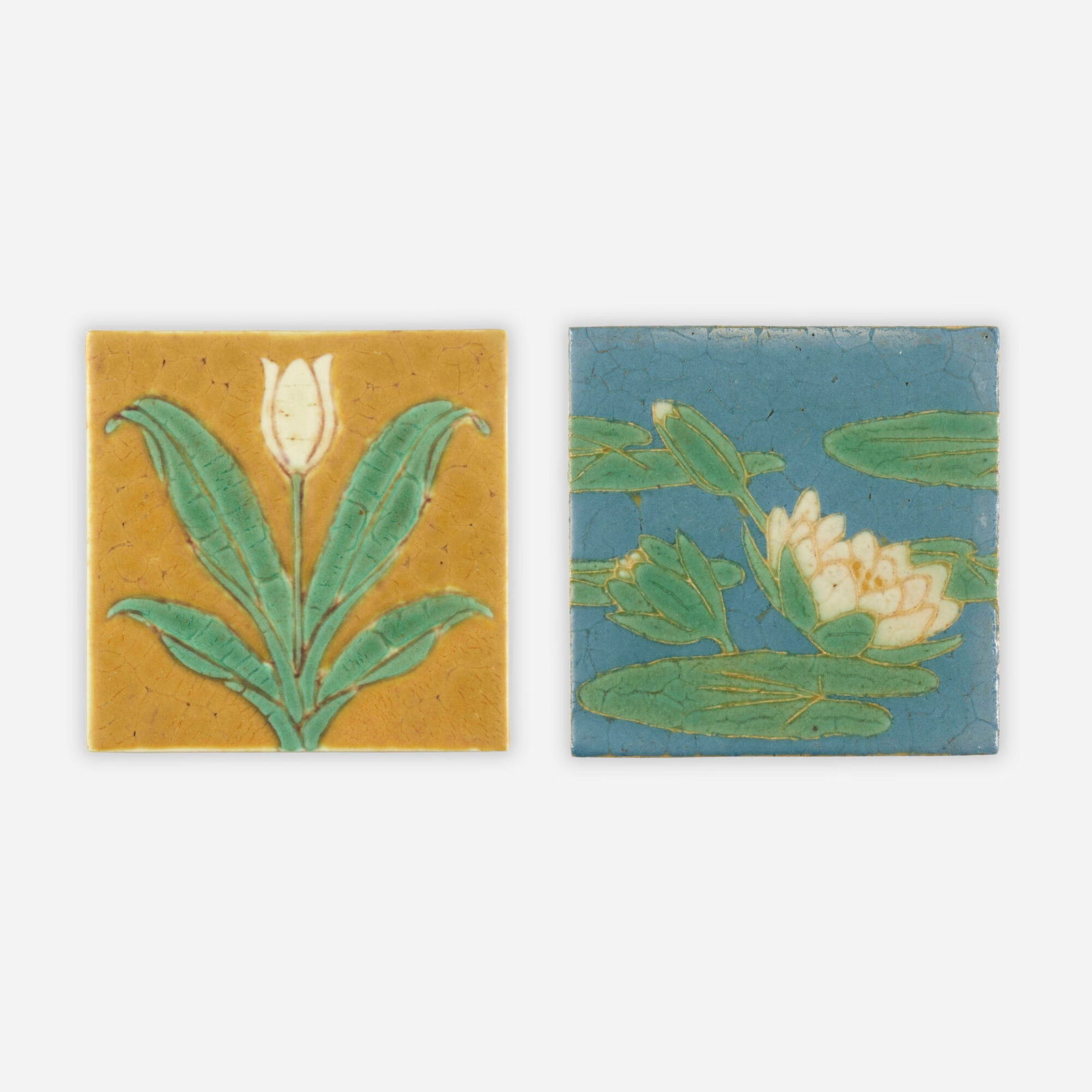 Grueby Faience Company, Tile and trivet: Grueby Faience Company Tile and trivet USA, c. 1905glazed earthenware decorated in cuenca .75 h x 6 w x 6 d in (2 x 15 x 15 cm) .375 h x 6 w x 6 d in (1 x 15 x 15 cm) Lot is comprised of a
