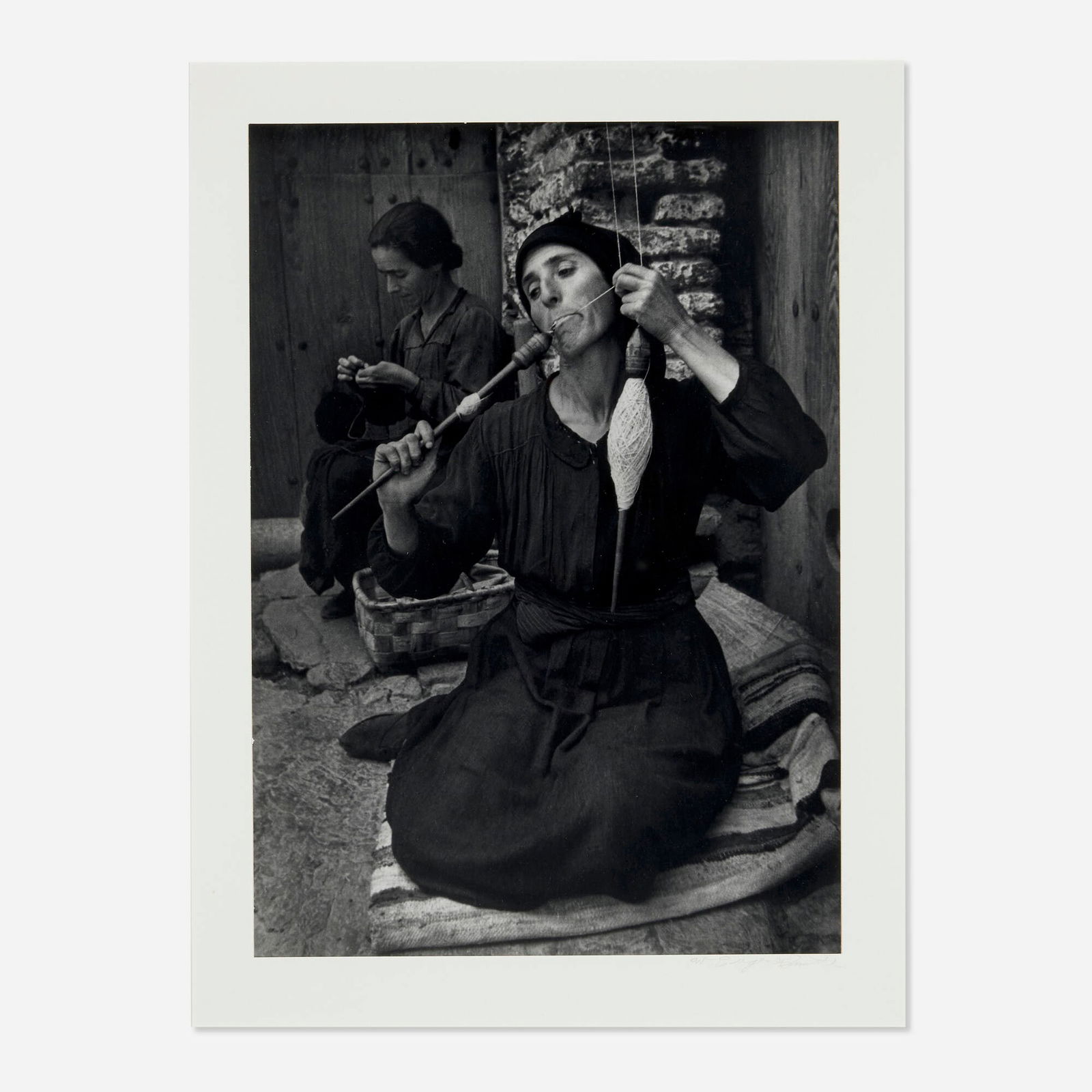 W. Eugene Smith, The Spinner (from the Spanish Village portfolio): W. Eugene Smith The Spinner (from the Spanish Village portfolio) 1950 / printed c. 1965gelatin silver print image: 12.75 h x 9 w in (32 x 23 cm) mount: 20 h x 16 w in (51 x 41 cm) Signed to