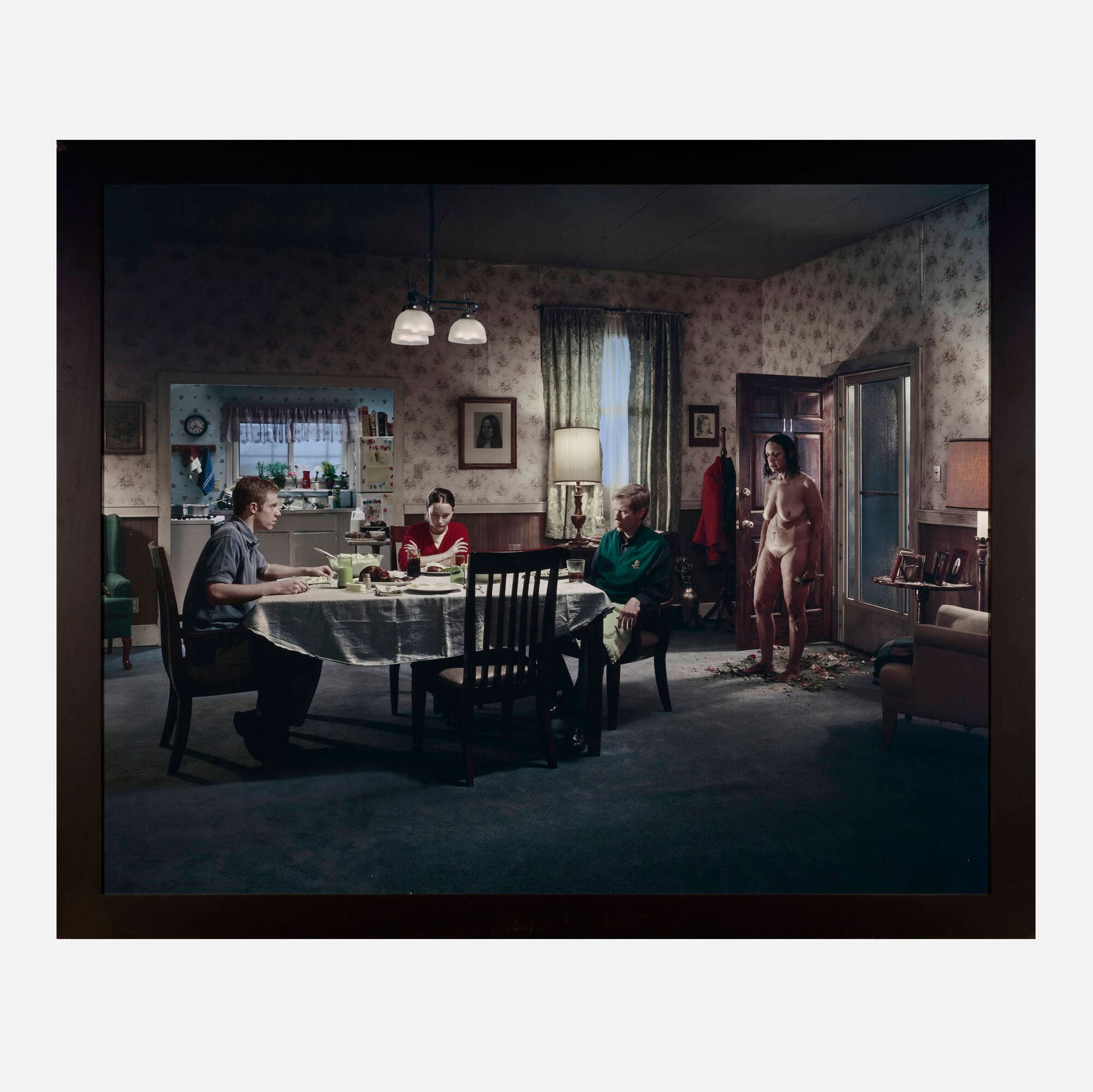 Gregory Crewdson, Untitled (Family Dinner): Gregory Crewdson Untitled (Family Dinner) 2001-02laser direct C-print mounted to aluminum in artist's frame sight: 53.5 h x 65.5 w in (136 x 166 cm) Signed to label to verso 'Gregory Crewdson'