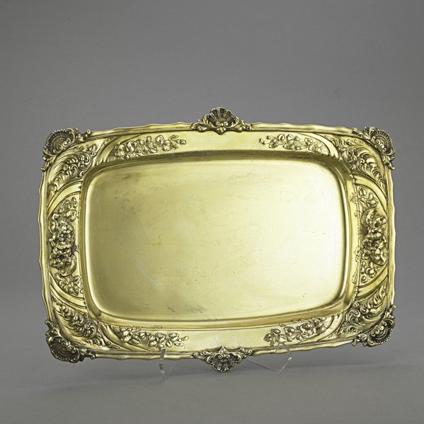 GORHAM SILVER ROEBLING MEAT TRAY: Silver-gilt rectangular #1226R, inscribed below rim "1865 - Roebling - 1890". Wavy rim with shell and scroll corners and centers, chased scroll and floral repousse. 61.9 OT, 17" x 11". Note: Washingto