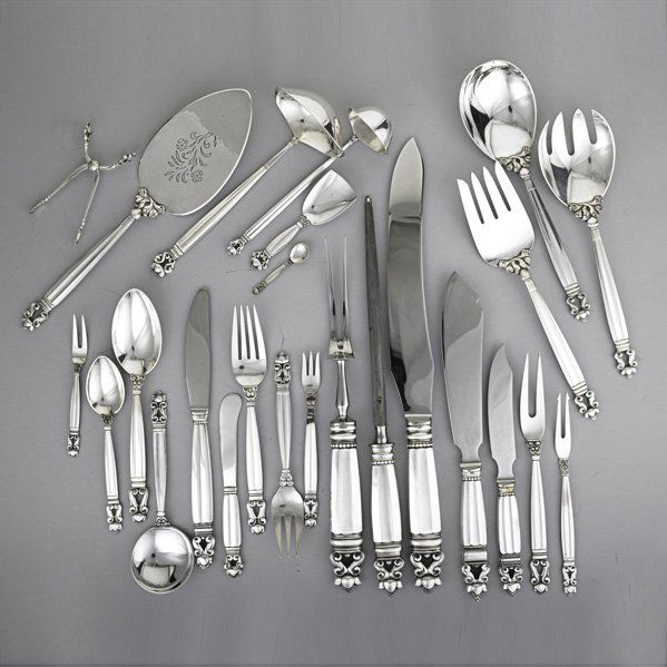 JENSEN SILVER "ACORN" FLATWARE, ca. 1950: Designed by Johan Rohde, 1915, ten piece service for twelve with twelve extras and twenty-three serving utensils: (16) dinner forks; (16) dinner spoons; (16) h.h. dinner knives; bouillon spoons; solid