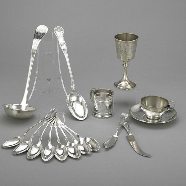 AMERICAN SILVER UTENSILS AND HOLLOWARE: Sixteen pieces, 1850-1900: (8) sterling spoons by Albert Cole, NYC, 7"; Tiffany & Co. bright-cut ladle, 12 1/2"; Gorham stuffing spoons with bead, 12"; Gorham "Saint Cloud" incised butter server, 7 5/