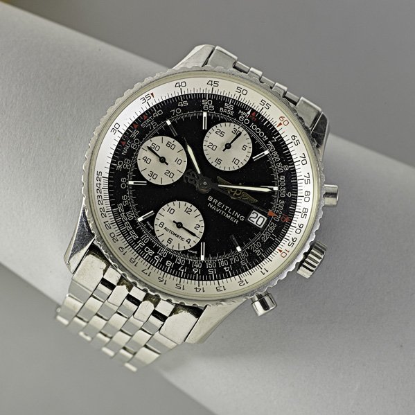 BREITLING NAVITIMER AUTOWIND A 13322: Stainless steel case and bracelet, black face with white seconds and chronograph subsidiary dials, date. Case #454269. 25 jewels. 41.5 mm.