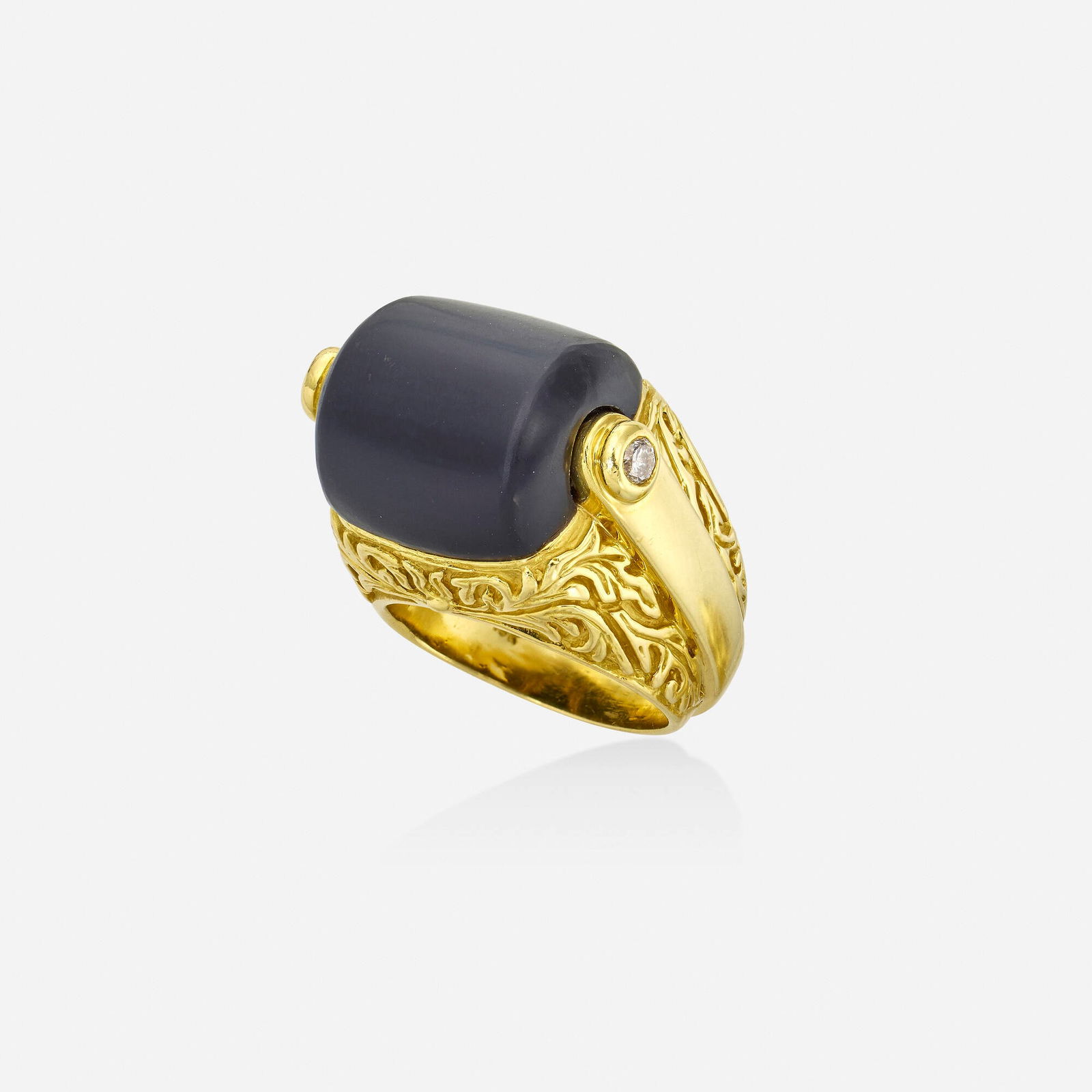 Marlene Stowe, Black chalcedony, diamond, and gold ring: Marlene Stowe Black chalcedony, diamond, and gold ring Set with a cabochon black chalcedony and round brilliant-cut diamonds, with ornamental gold band 18k yellow gold Signed M. Stowe Ring size 8.25
