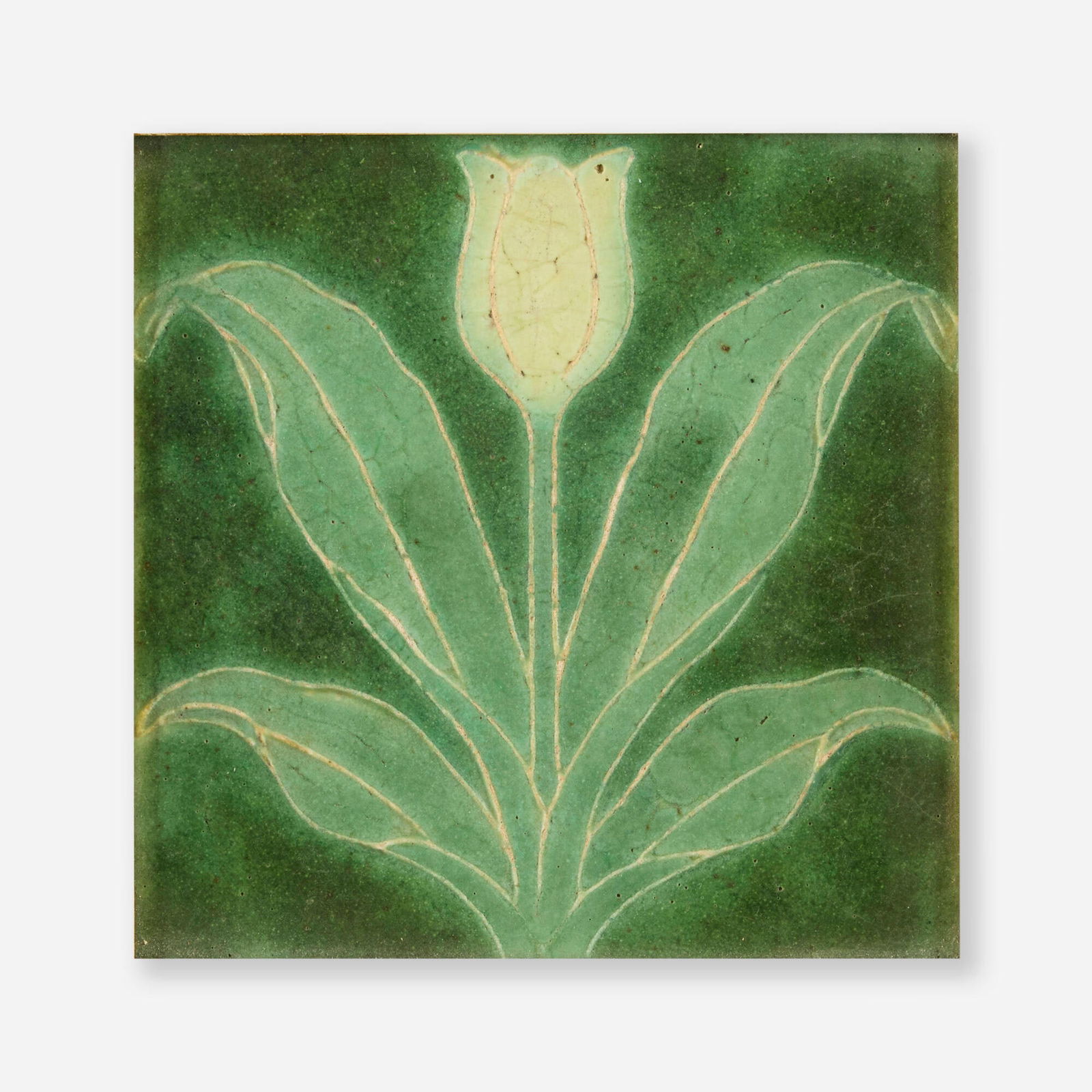 George P. Kendrick for Grueby Faience Company, Trivet tile with yellow tulip: George P. Kendrick for Grueby Faience Company Trivet tile with yellow tulip USA, 1901glazed earthenware decorated in cuenca 6 h x 6 w x 1 d in (15 x 15 x 3 cm) Provenance: Pri