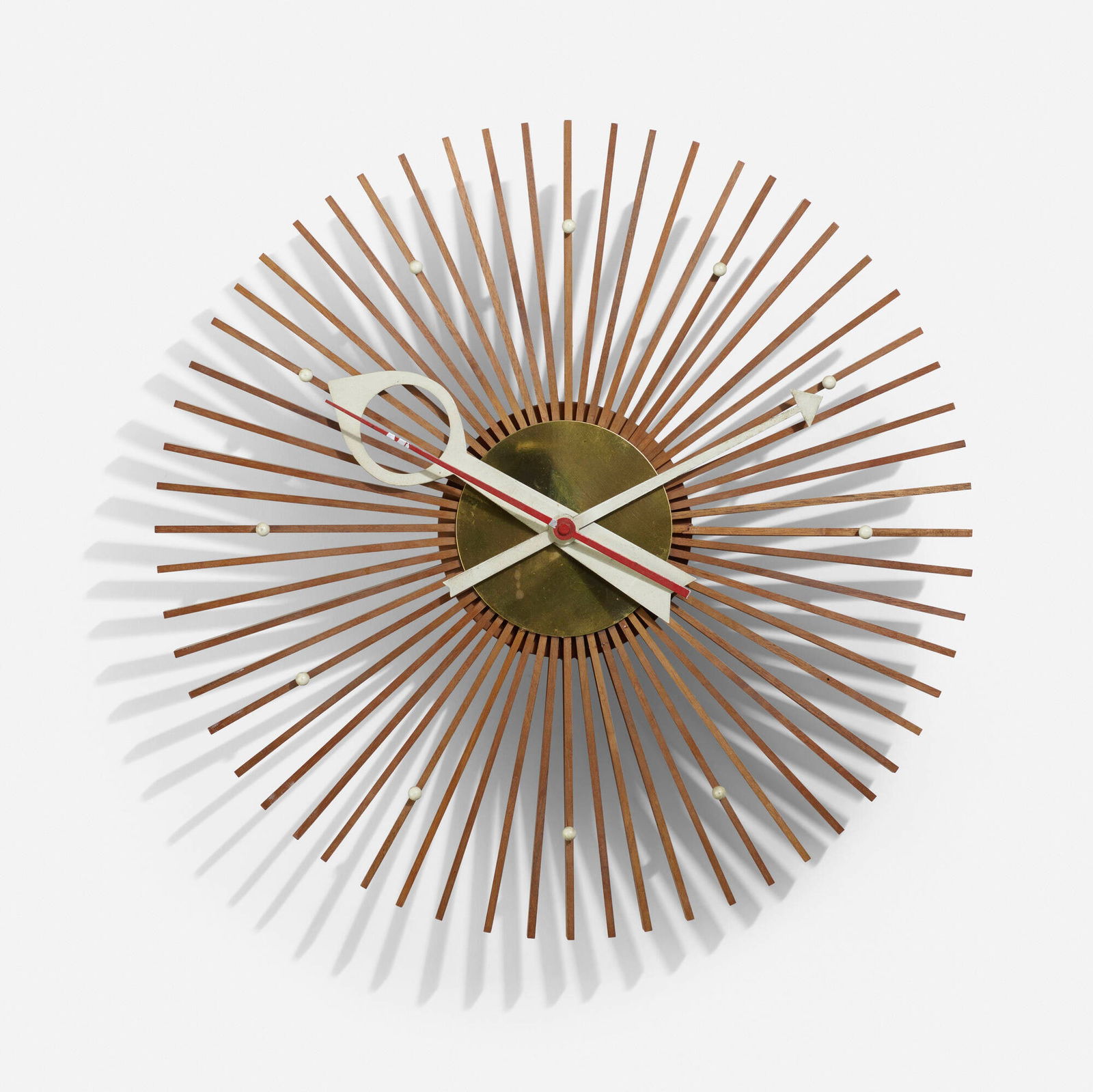 George Nelson & Associates, Popsicle wall clock, model 2257A: George Nelson & Associates Popsicle wall clock, model 2257A Howard Miller Clock CompanyUSA, 1957walnut, brass, enameled aluminum 3¼ d × 13¾ dia in (8 × 35 cm) Partial decal